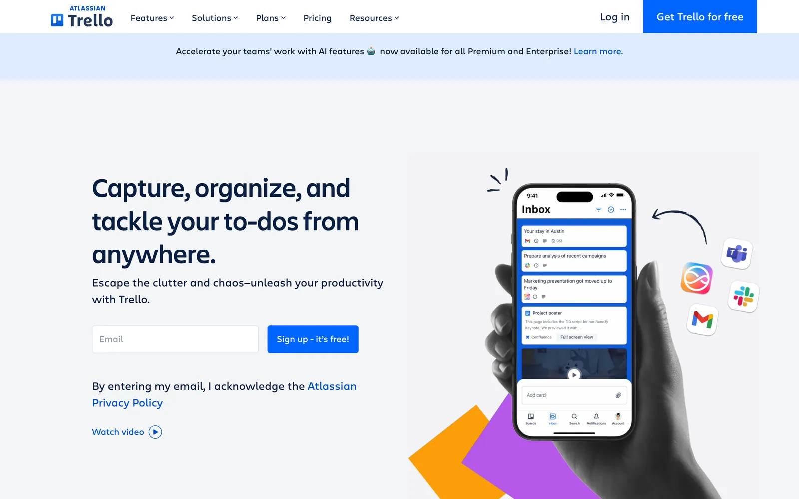 Trello homepage with the headline Capture, organize, and tackle your to-dos from anywhere, next to a phone showing a Trello inbox